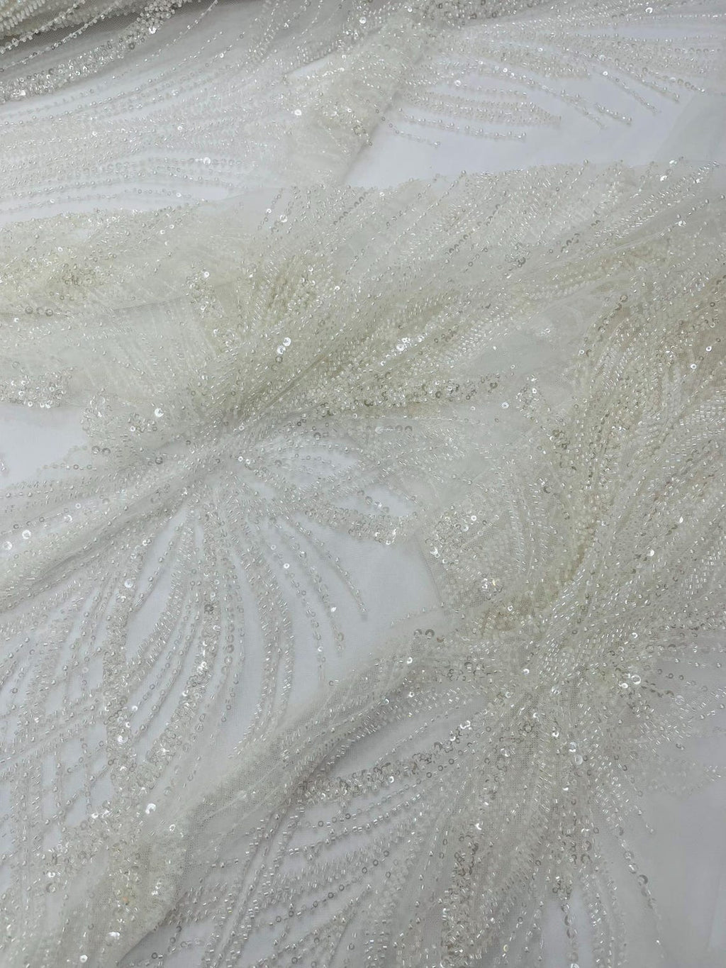 BRIDAL  - WHITE - Designs Embroider with Sequins and Heavy Beaded on a Mesh Lace Fabric - Sold By The Yard