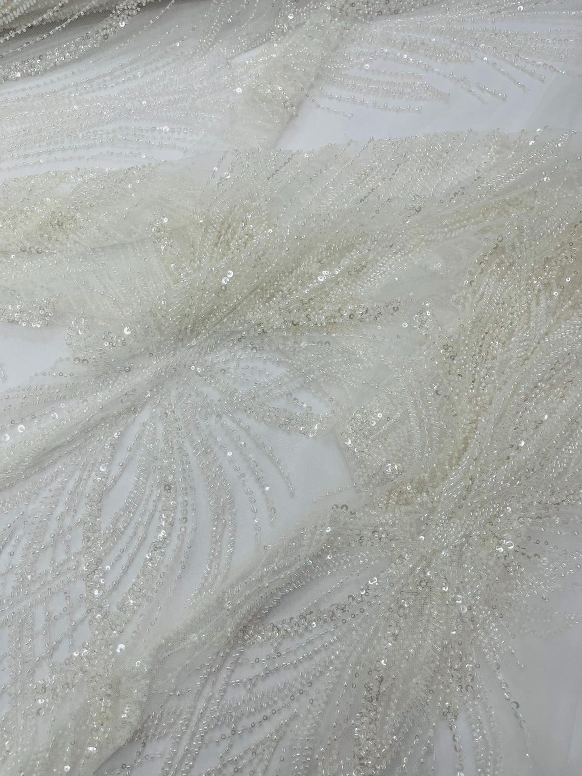 BRIDAL  - WHITE - Designs Embroider with Sequins and Heavy Beaded on a Mesh Lace Fabric - Sold By The Yard