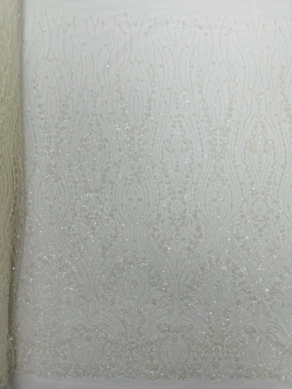 FEATHER  - IVORY - Designs Embroider with Sequins and Heavy Beaded on a Mesh Lace Fabric - Sold By The Yard