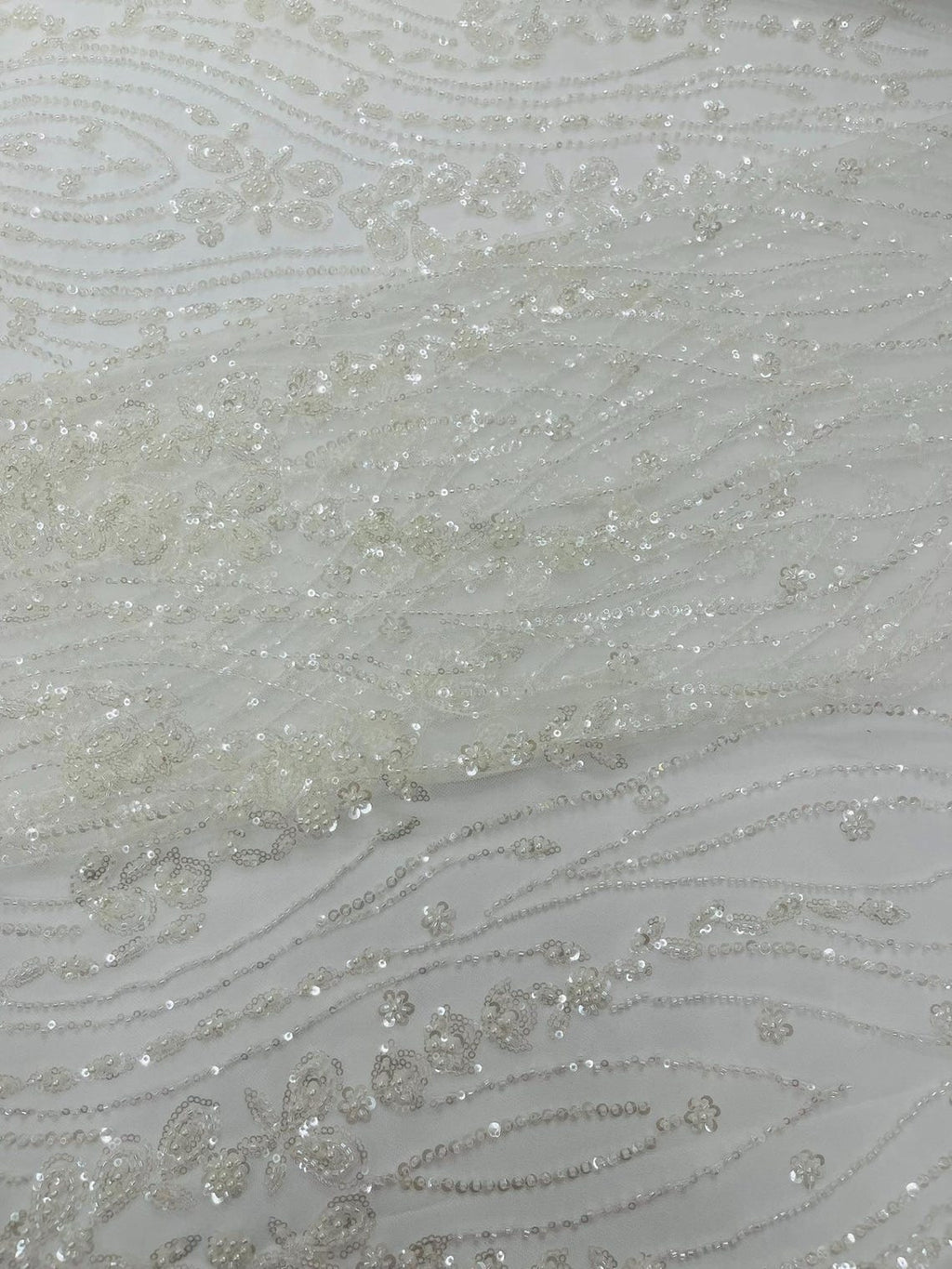 FEATHER  - IVORY - Designs Embroider with Sequins and Heavy Beaded on a Mesh Lace Fabric - Sold By The Yard