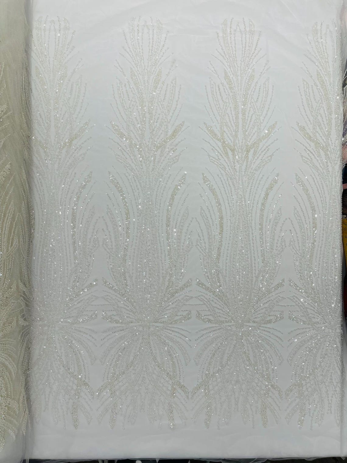BRIDAL  - WHITE - Designs Embroider with Sequins and Heavy Beaded on a Mesh Lace Fabric - Sold By The Yard