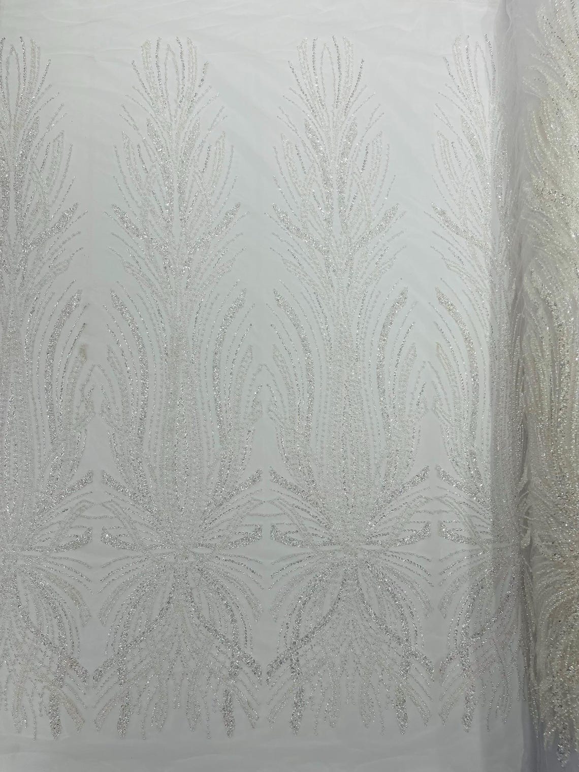 BRIDAL  - WHITE - Designs Embroider with Sequins and Heavy Beaded on a Mesh Lace Fabric - Sold By The Yard
