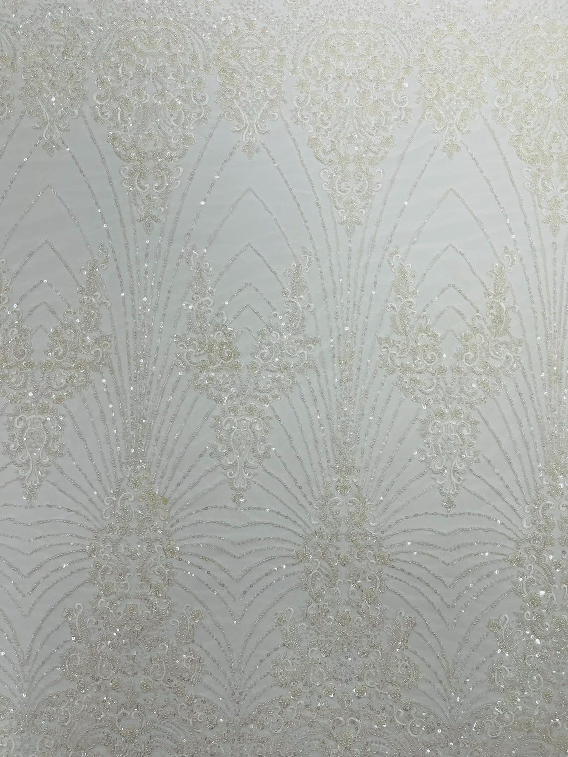 DAMASK  -IVORY - Designs Embroider with Sequins and Heavy Beaded on a Mesh Lace Fabric - Sold By The Yard