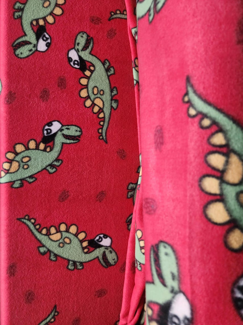 Red Dinosaur Print Anti Pill Theme Fleece Fabric, 60” Inches Wide – Sold By The Yard