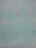 Luxury Fashion Design with Sequins Embroider on a 4 Way Stretch Mesh Fabric-Sold by The Yard. Aqua Blue Iridescent