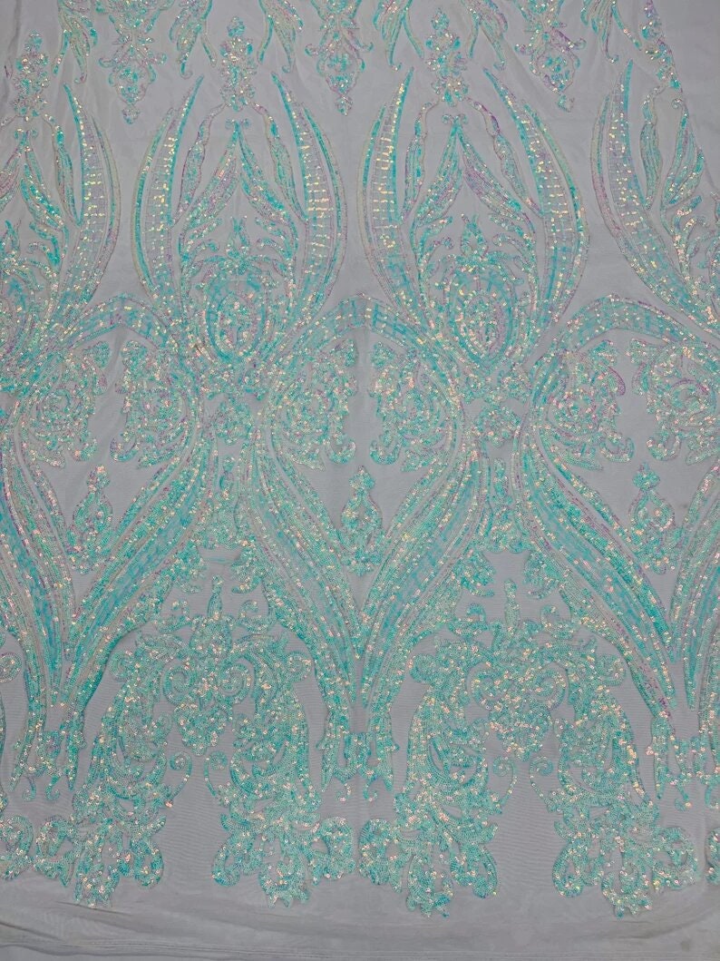 Luxury Fashion Design with Sequins Embroider on a 4 Way Stretch Mesh Fabric-Sold by The Yard. Aqua Blue Iridescent