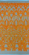 4 Way Stretch Fashion Design with Sequins Embroider on a 4 Way Stretch Mesh Fabric-Sold by The Yard. Neon Orange/Nude