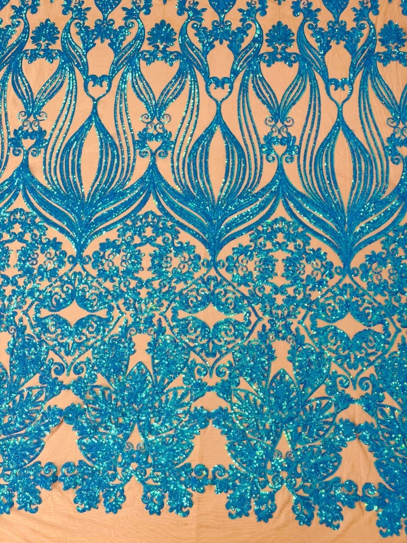 4 Way Stretch Fashion Design with Sequins Embroider on a 4 Way Stretch Mesh Fabric-Sold by The Yard. Turquoise/Nude